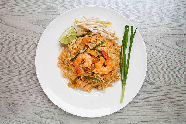 istock Pad Thai, Stir-fried rice noodles with shrimps 460305535