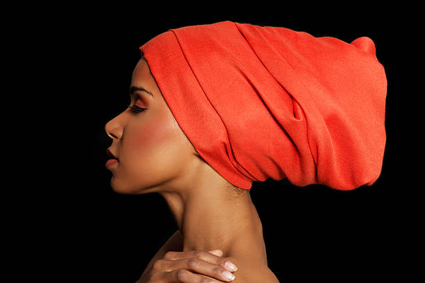 istock Attractive woman's profile in turban. Closed eyes. 460306429
