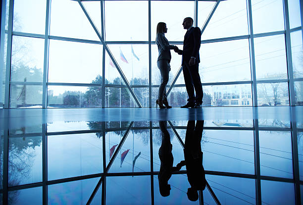 istock Business partners handshaking 460327369