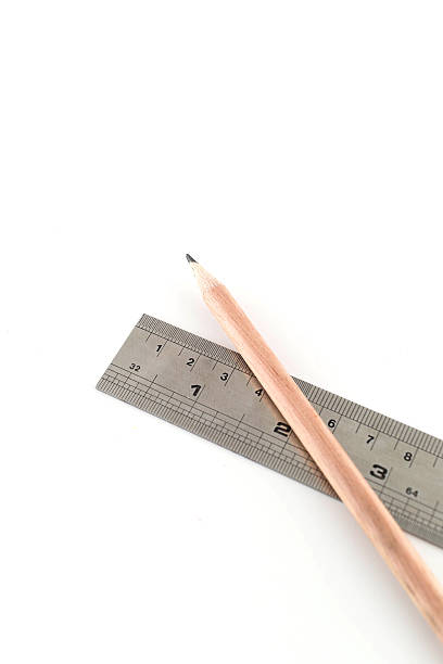 istock pencil and ruler isolated on white background 460328031
