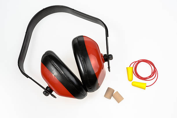 equipo de protección auditivos - orejeras fotografías e imágenes de stock