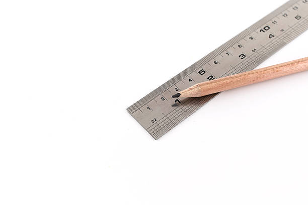 istock pencil and ruler isolated on white background 460351661