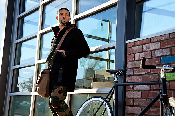 istock Young Entrepreneur in City with Bicycle 460353207