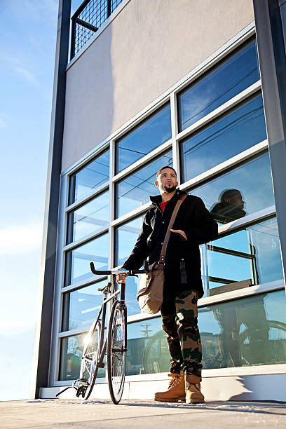 istock Young Entrepreneur in City with Bicycle 460353245