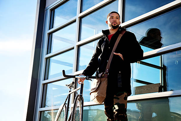Young Entrepreneur in City with Bicycle