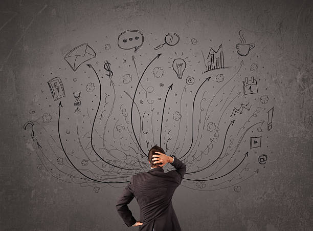 istock Businessman in front of a chalkboard 460354613