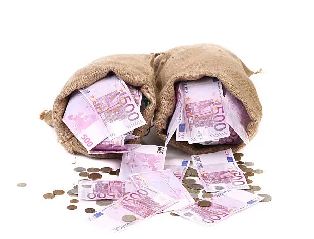 Two full sack with money. Isolated on a white background.