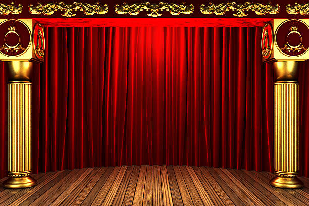 istock red fabric curtain on golden stage 460356383