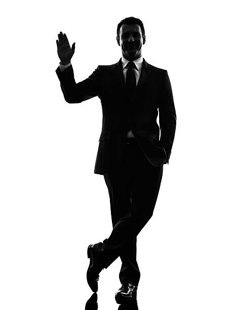 istock business man saluting silhouette 460359731