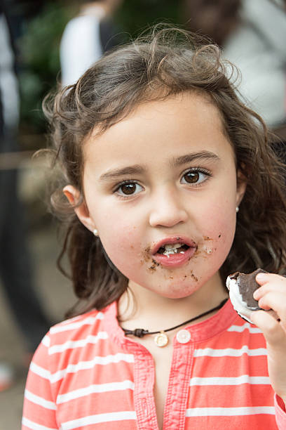 istock Little girl having an ice cream 460363245