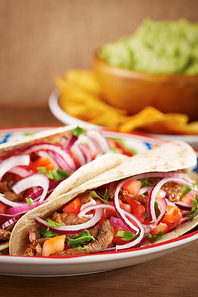 istock Beef meat and vegetables Mexican tacos 460363463