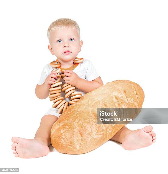 Small Child With Big Loaf Of Bread Isolated On White Stock Photo - Download Image Now