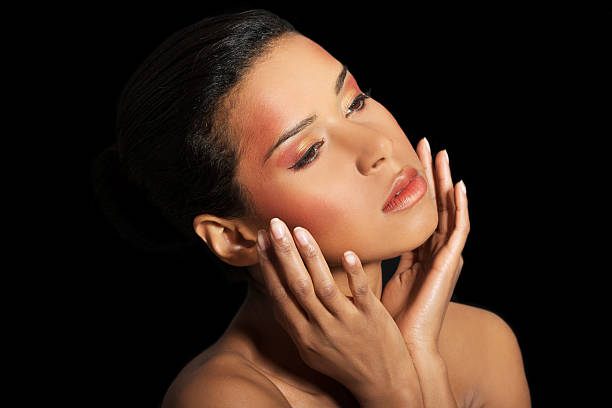 istock Attractive woman's face with her hands close. 460381327