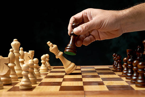 istock wooden chess board with pieces on. 460387485