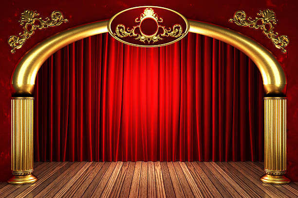 istock red fabric curtain on golden stage 460390705