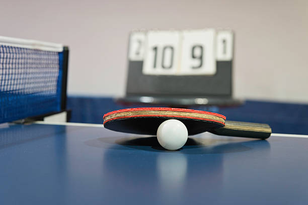 istock Table tennis racket and ping pong ball 460391523