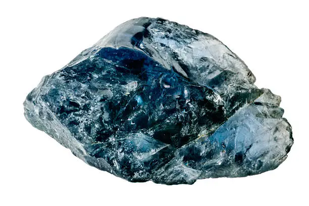 Photo of Uncut blue sapphire against white background