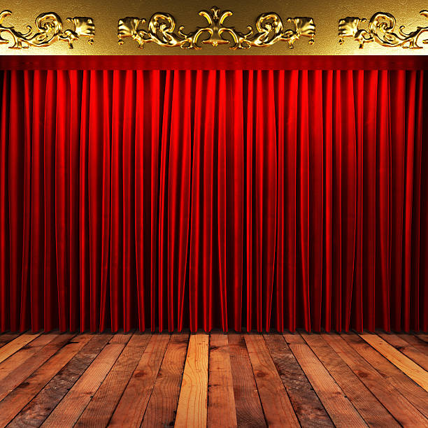 istock red fabric curtain with gold on stage 460407675
