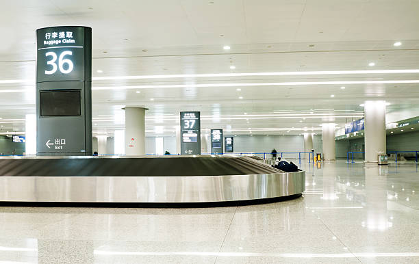 istock Single suitcase alone on airport carousel 460411227