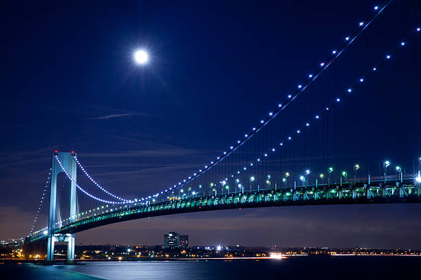 Verrazano Narrows Bridge in New York City Verrazano Narrows Bridge in New York City at evening. It connects Brooklyn with Staten Island. bridge crossing cloud built structure stock pictures, royalty-free photos & images