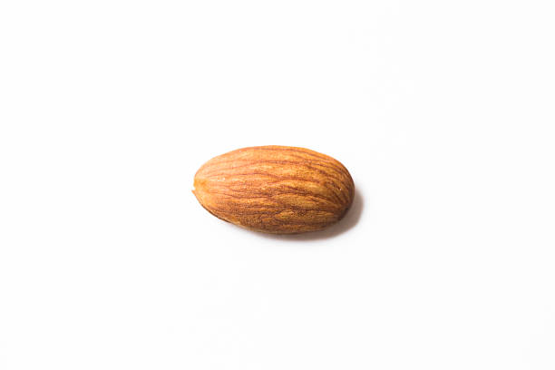 Almond on a white background stock photo