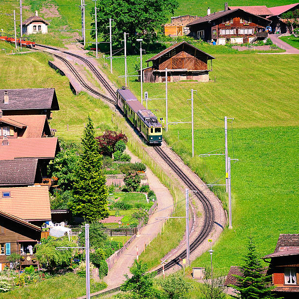 comboio de passageiros. - interlaken railroad station train rural scene imagens e fotografias de stock