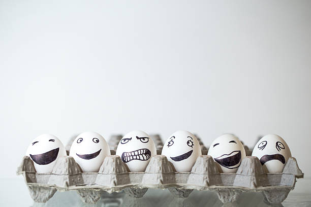 Row of emoji eggs stock photo