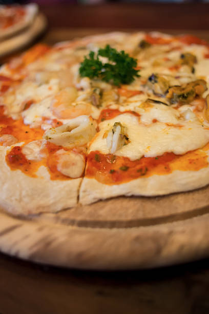 istock Seafood pizza produces from wood fired oven. 460423767