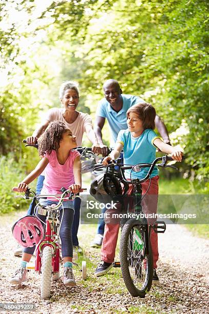 Grandparents With Grandchildren On Cycle Ride In Countryside Stock Photo - Download Image Now