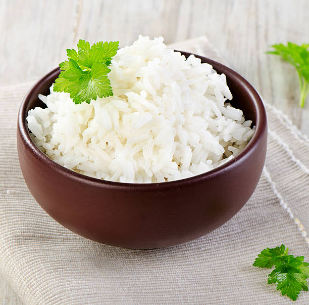istock Vibrant isolated fresh cooked rice in modern bowl 460441881