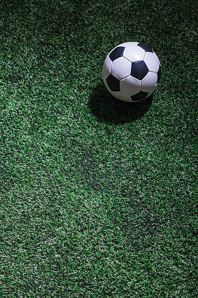istock Soccer field with ball 460450165
