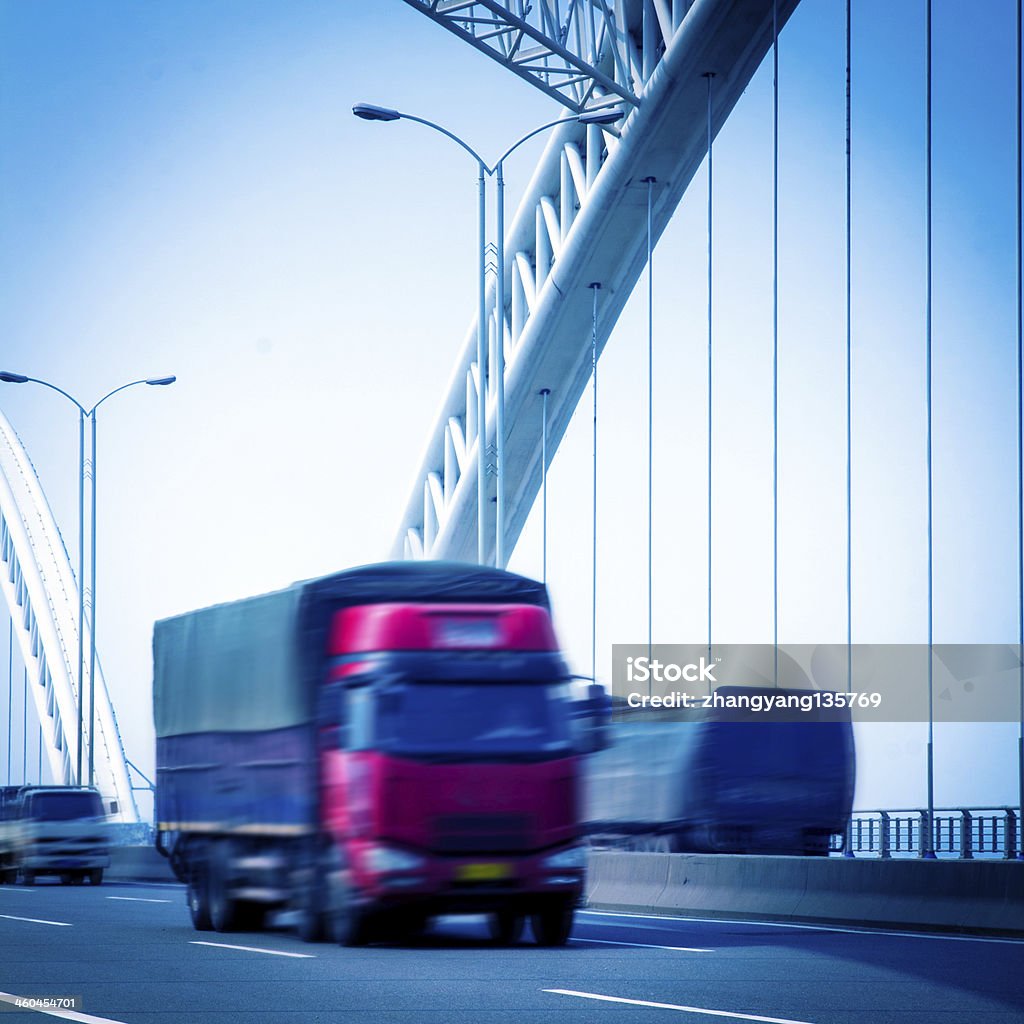 bridge speeding truck go through the bridge. Blue Stock Photo