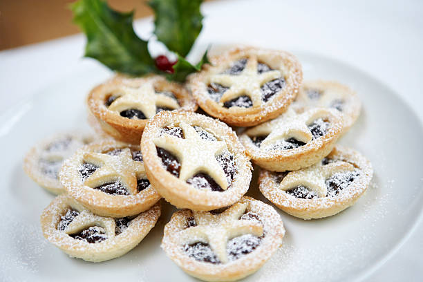 A plate filled with Christmas mince pies stock photo