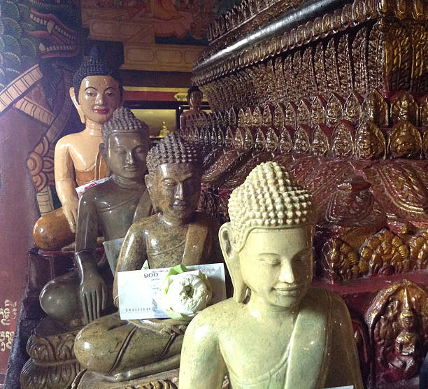 istock Buddha sculptures in temple. 460469959