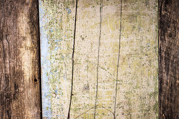 istock Weathered Textured wood background with old painting 460473805
