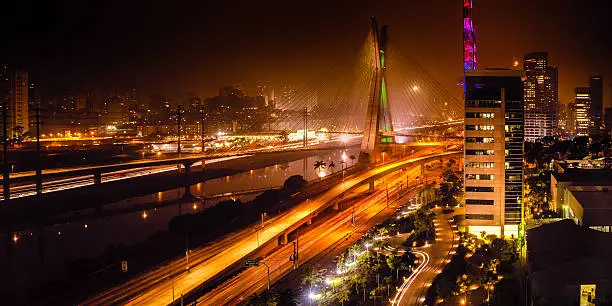 Most famous bridge in the city at night, Octavio Frias De Oliveira Bridge, Pinheiros River, Sao Paulo, Brazil