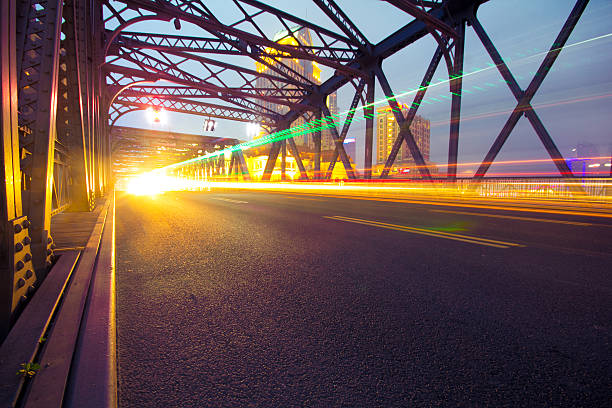 istock night traffic lights inside of steel bridge 460481845