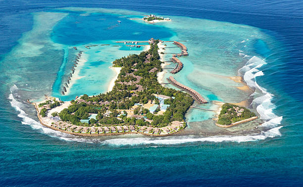 istock Maldives sea island from air 460491731