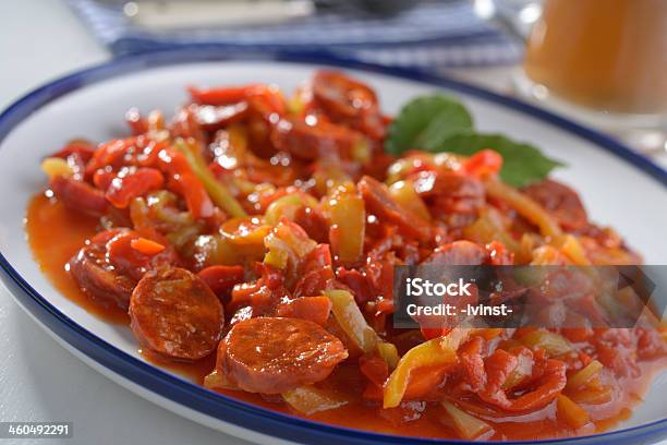 Lecso With Spiced Sausage On A Plate Stock Photo - Download Image Now - Bay Leaf, Beer - Alcohol, Blue