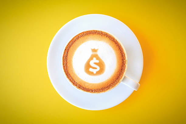 чашка кофе с мешок денег знак - food currency breakfast business стоковые фото и изображения