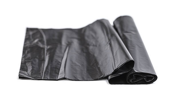 istock Roll of black trash bags 460492793