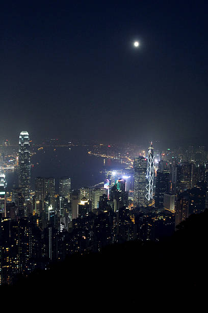 istock Victoria Harbor Hong Kong with moonlight 460497895