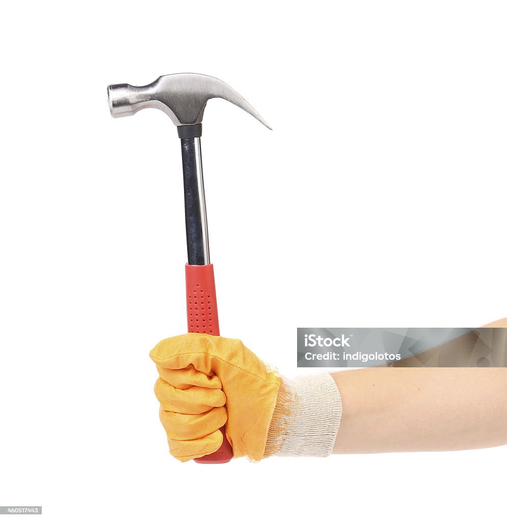 Hand holding hammer. Hand holding hammer. Isolated on a white background. Activity Stock Photo
