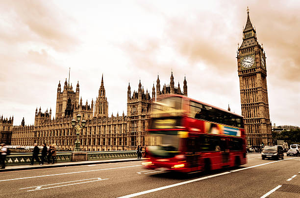 istock London Double Decker Bus Near Big Ben Tower 460519489