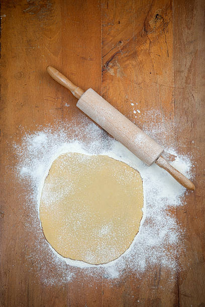 istock Cookie Dough on wooden Table with Rolling Pin 460519903