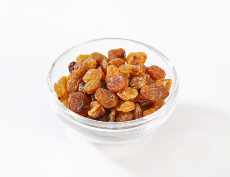 Golden raisins in a bowl