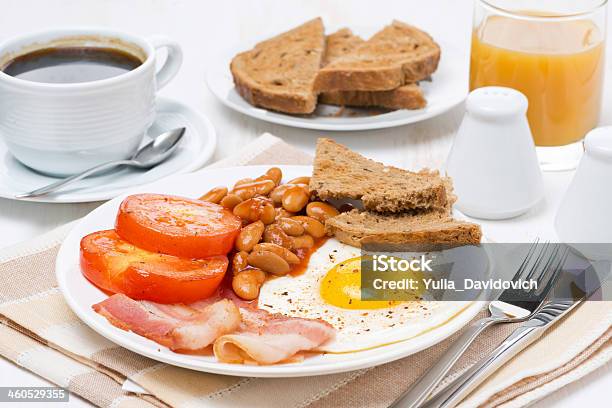 Traditional English Breakfast With Fried Eggs Bacon And Beans Stock Photo - Download Image Now