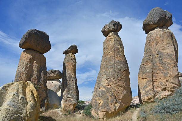 Cappadocia - Fairy Chimneys These Fairy Chimneys rock formation are situated nearly Goreme in Cappadocia - Turkey. The area is a popular tourist destination. Goreme stock pictures, royalty-free photos & images