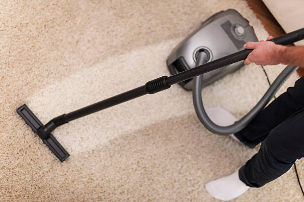 istock Close up of vacuuming a carpet 460548769