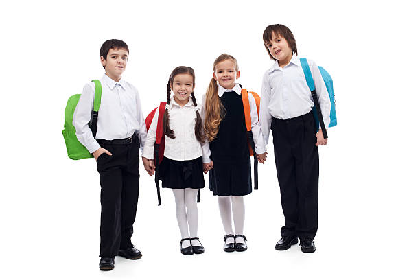 istock Group of children holding hands going back to school 460549635